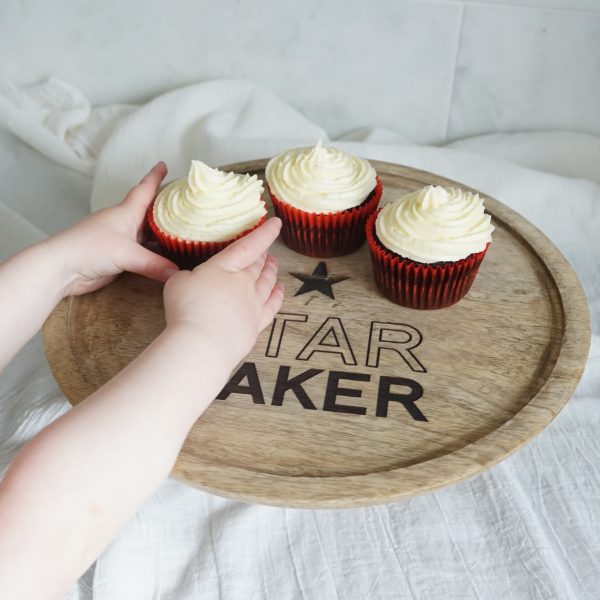 wooden star baker personalised cake stand with helping hands