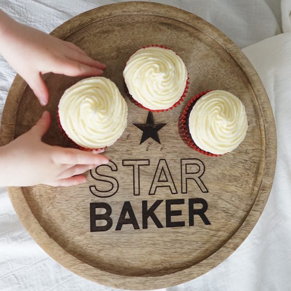 wooden star baker personalised cake stand with helping hands