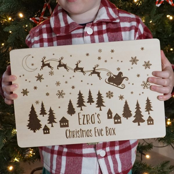 Personalised Christmas Eve Box held by little boy